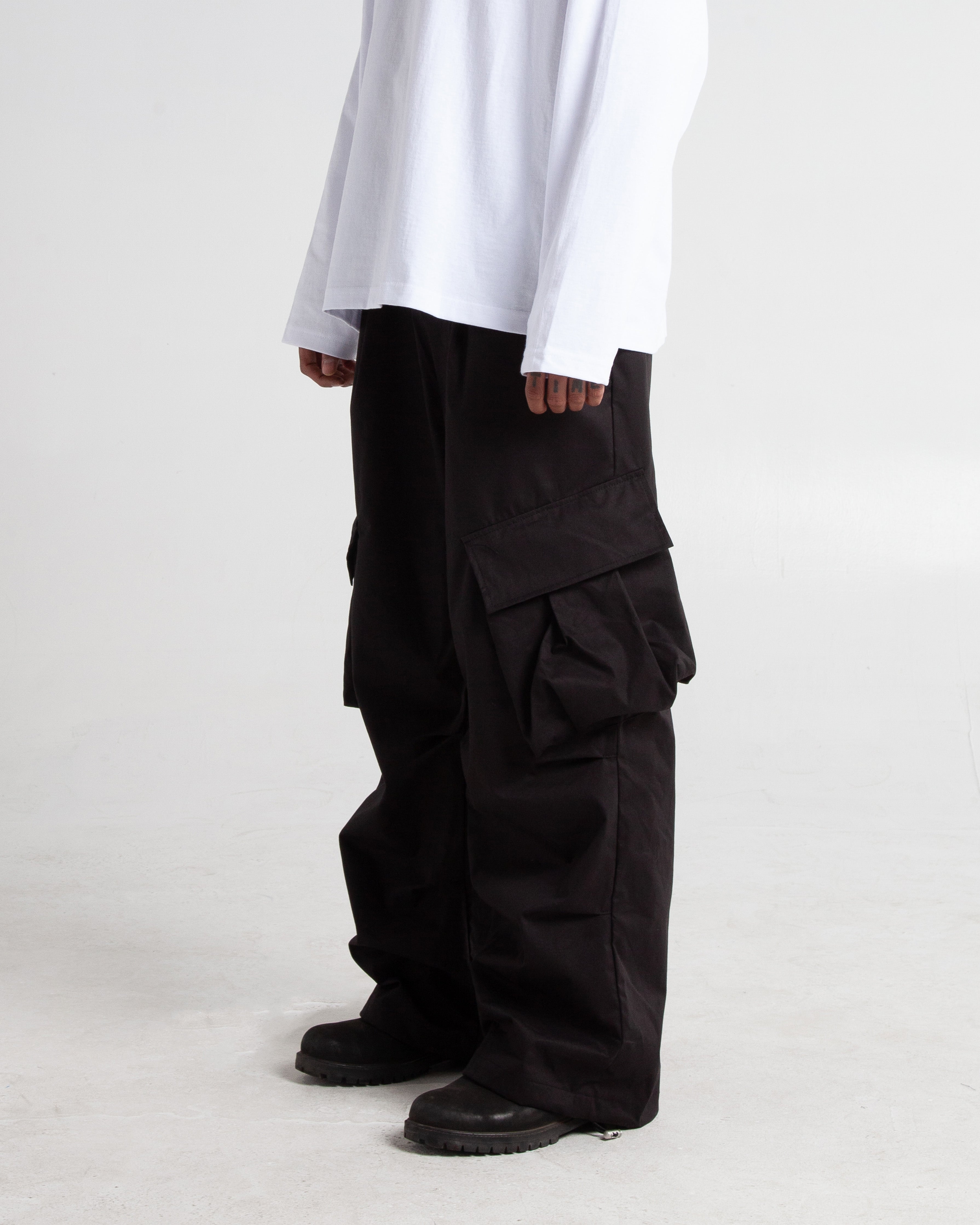 ノースフェイス Stretch Twill Cargo Pants ブラック THE NORTH FACE（ザノースフェイス）の「THE NORTH FACE PURPLE